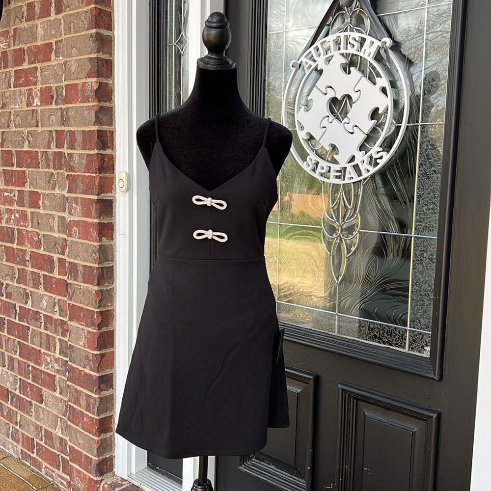 Lulu's Black Mini Dress with Ivory Bow Accents